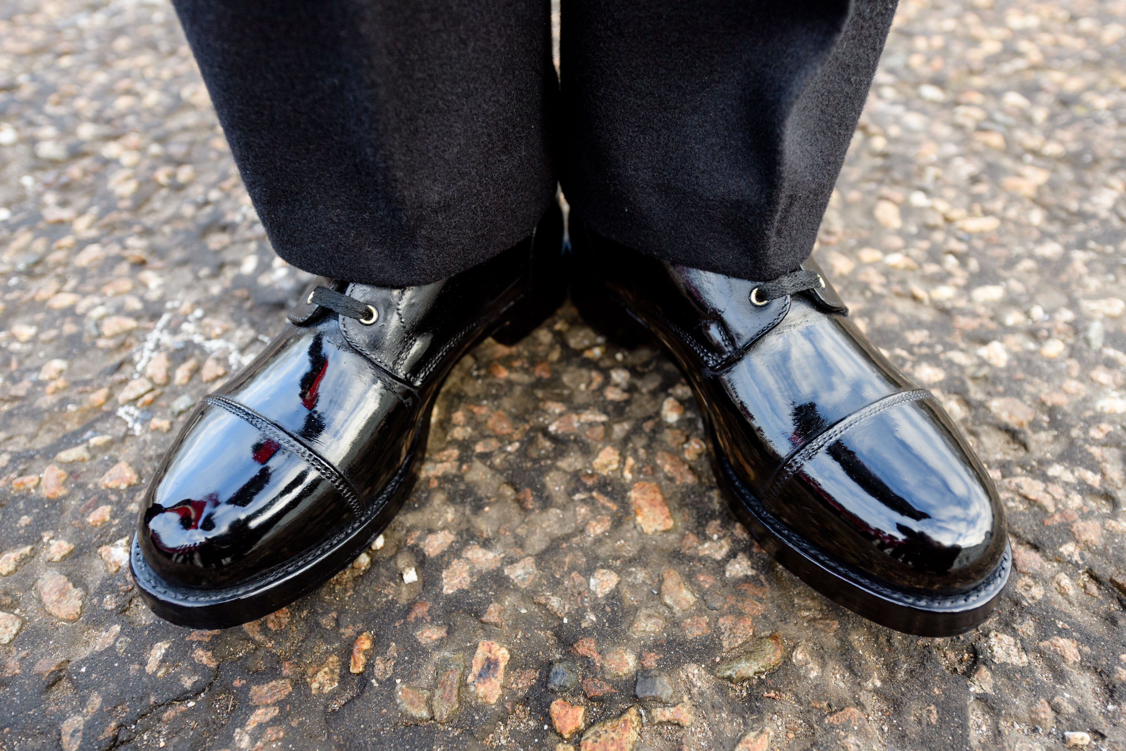 A close-up view of a Guardsman's polished boots. 